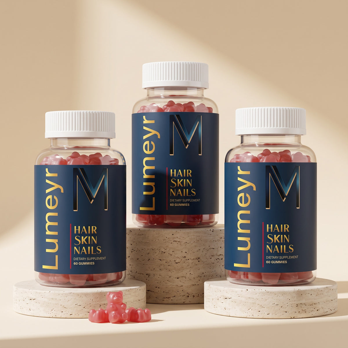 Three bottles of Lumeyr Hair Skin Nails gummies on stone plinths of different heights - 3-month supply